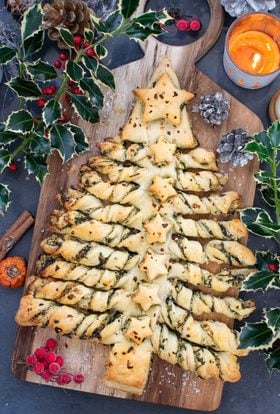 Vegan pull-apart Christmas tree with twisted puff pastry branches and stars