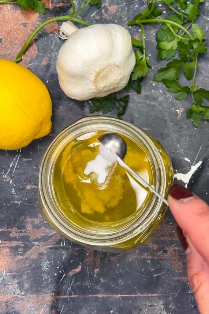 adding salt to lemon vinaigrette