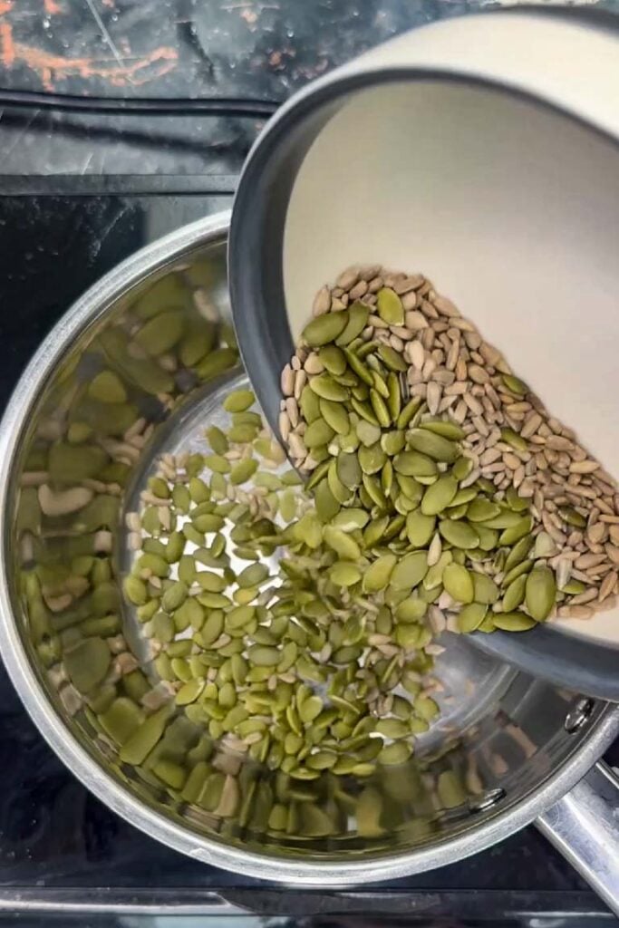 dry toast the sunflower and pumpkin seeds