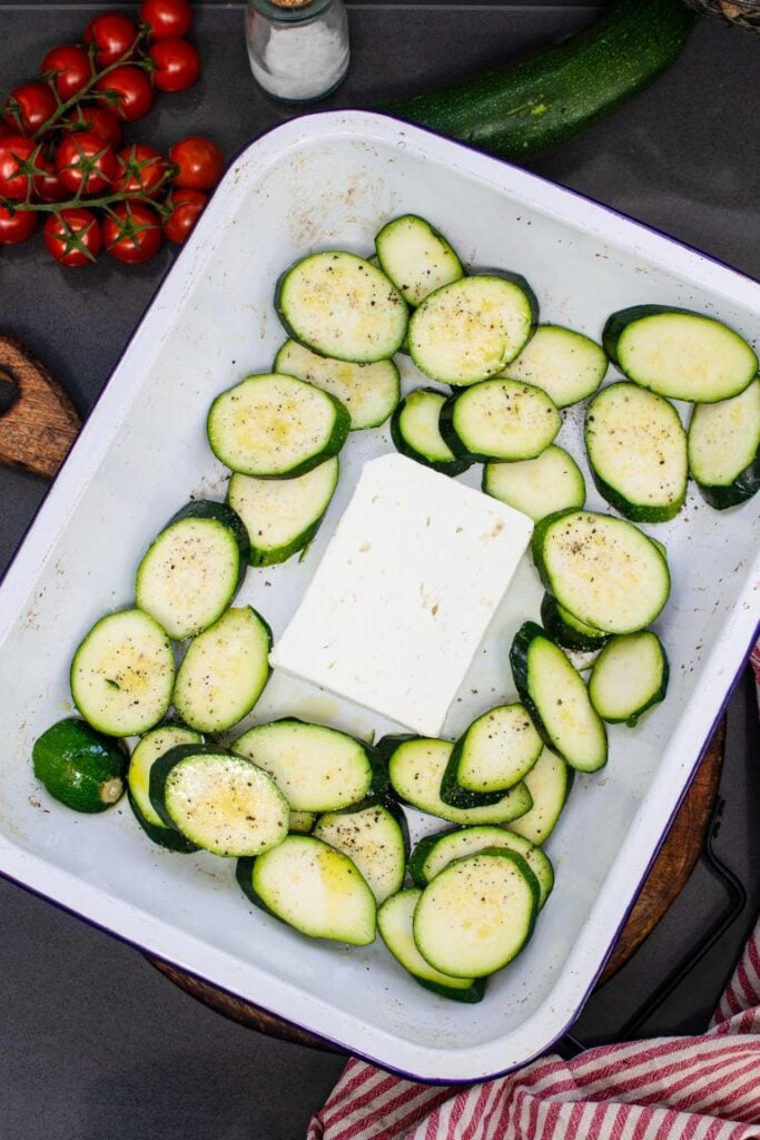 feta and courgettes on an oven tray
