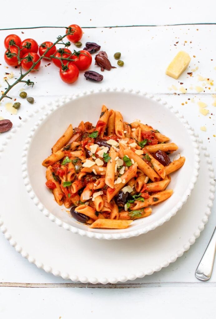 Mediterranean-style pasta puttanesca with rich tomato sauce and briny olives