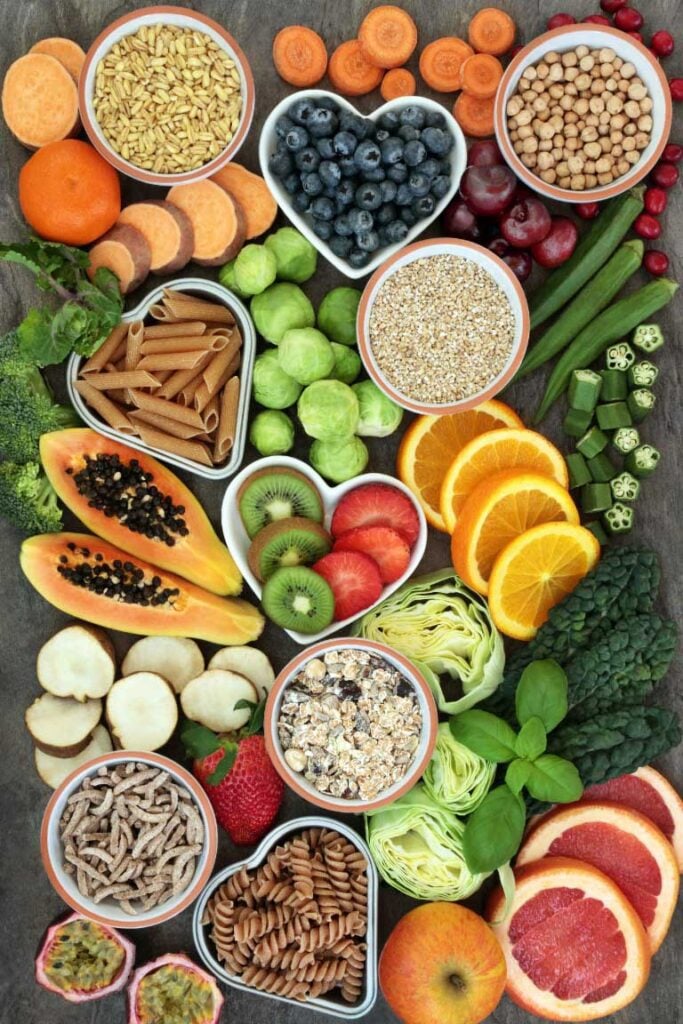 Fibre-maxxing flat lay with wholegrains, brussels sprouts, chickpeas, papaya and citrus fruit