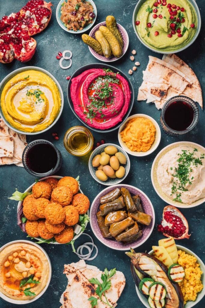 Vegetarian Turkish meze spread with hummus, falafels and stuffed vine leaves
