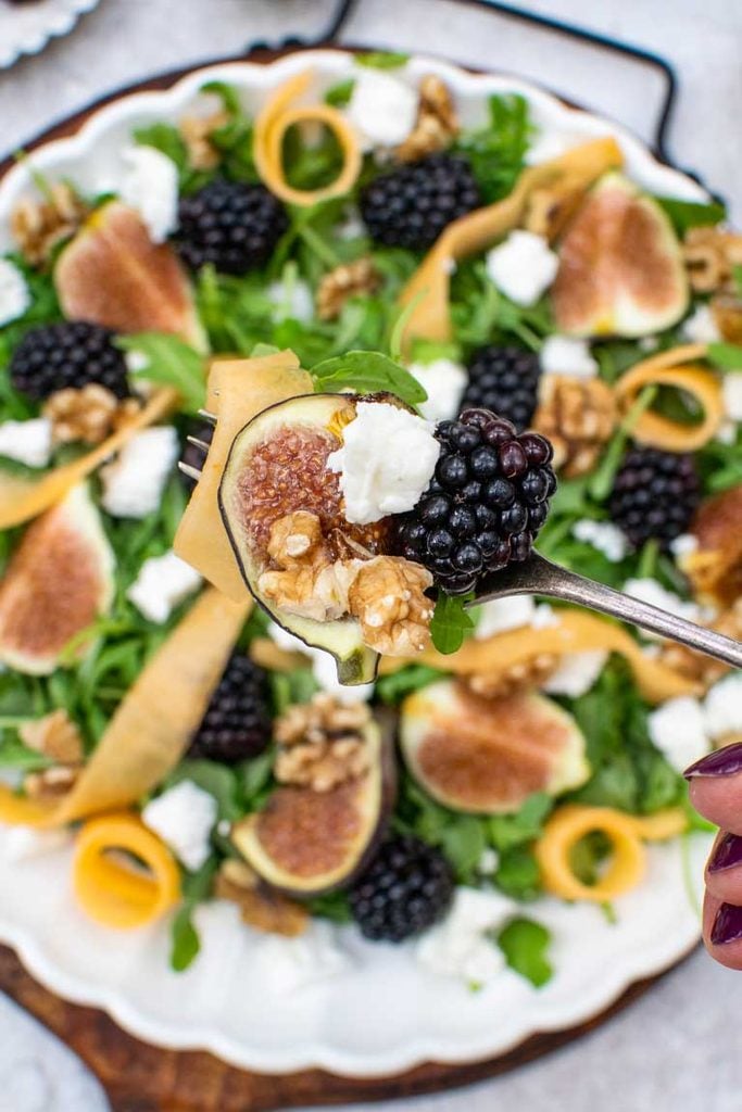 Fresh figs, blackberries, melon and walnuts for fig salad