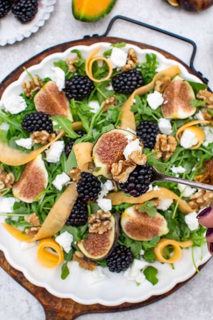 Fig salad with balsamic dressing served with spoon