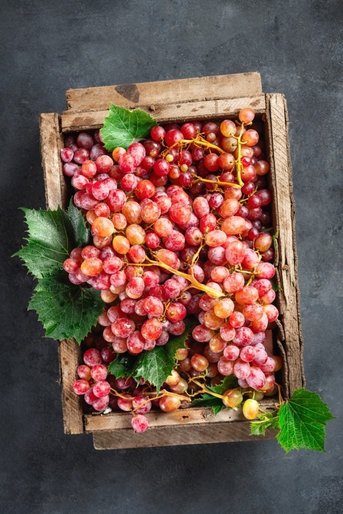 wooden crate of grapes
