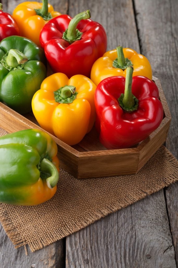 bell pepper crop in wooden box