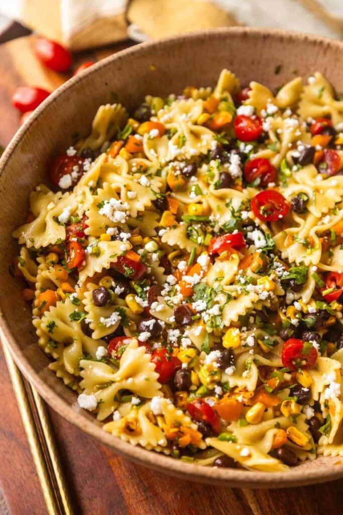 close up of bow pasta salad in salad bowl