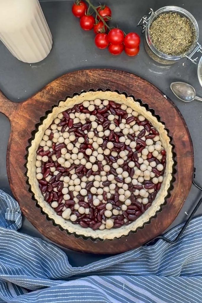 baking blind pastry case with baking beans