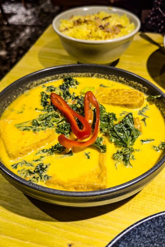 Gulai Daun Singkong Pete, minced kale slow-braised in a coconut curry