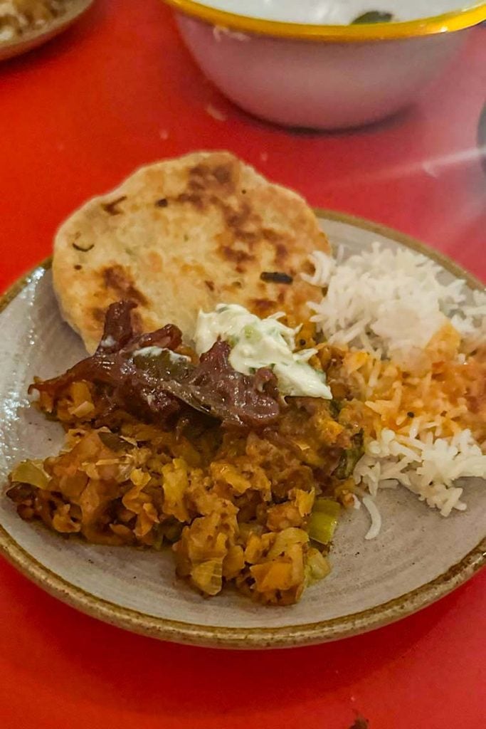 Coconut and chaat masala pongal with seared mushroom, pol roti and fragrant rice at Trinco